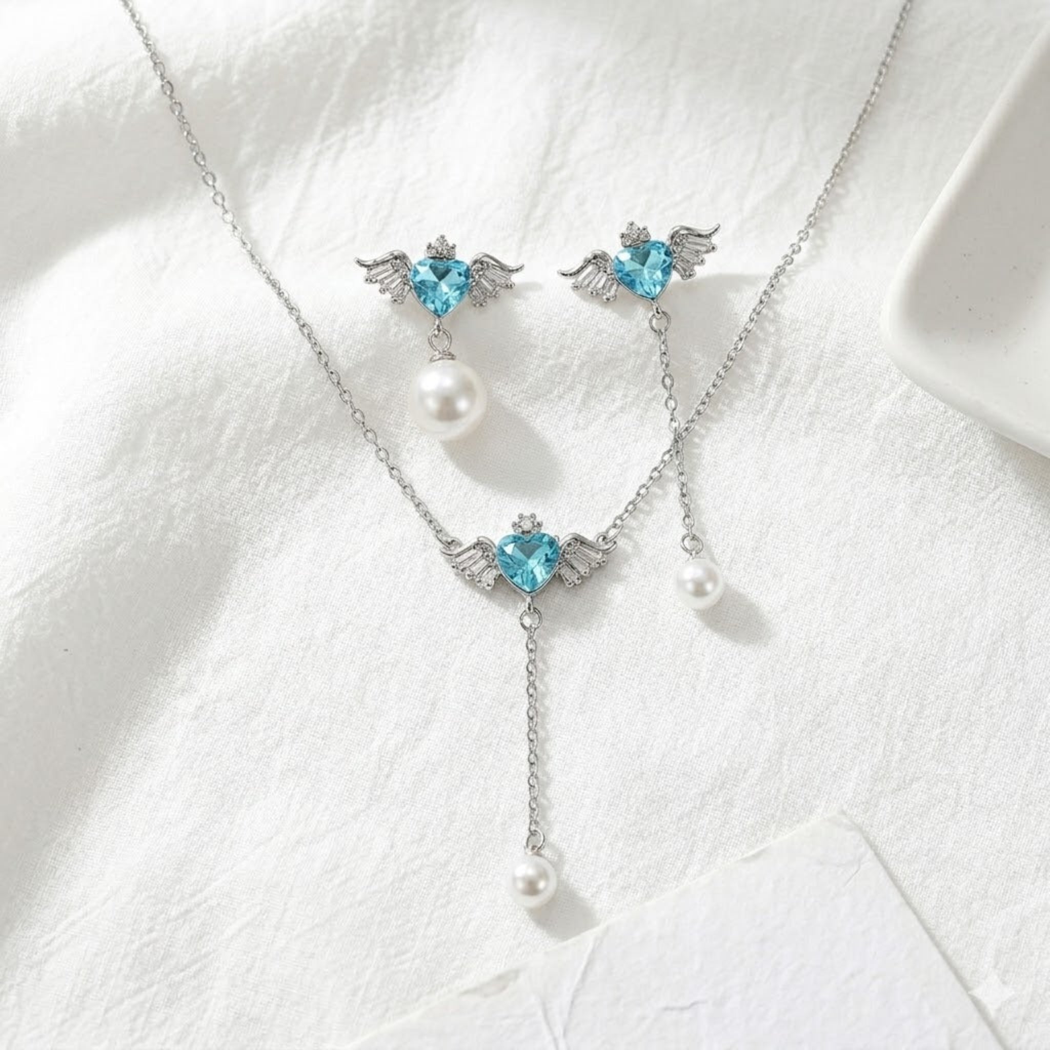 Ethereal Romance: The Winged Heart &amp; Pearl Set