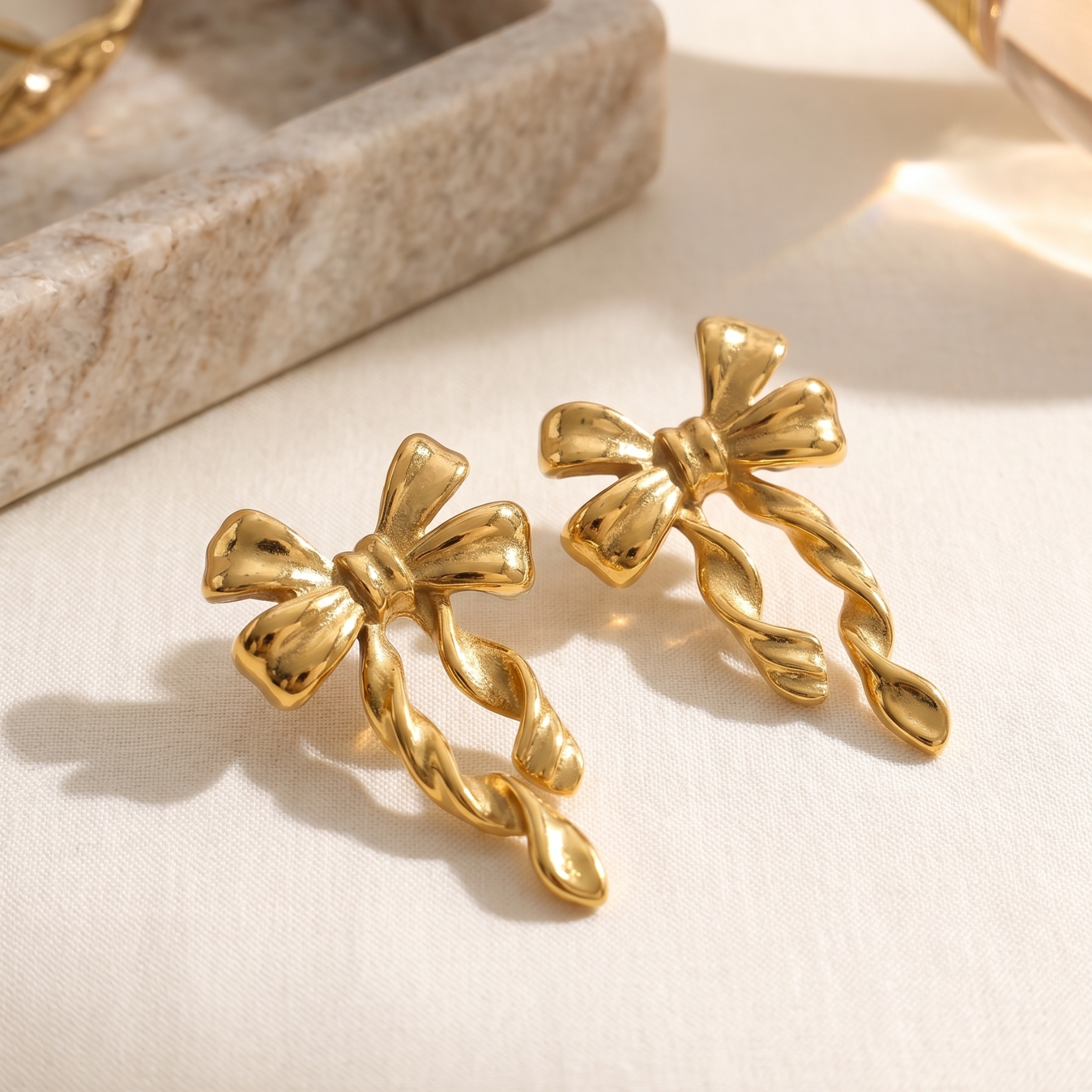 Golden Grace: The Twisted Bow Earrings