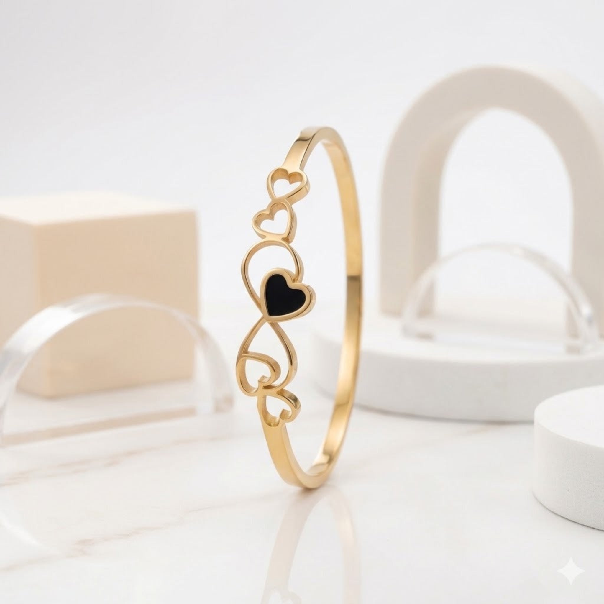 Infinite Romance: The Intertwined Heart Bangle