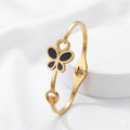 Playful Radiance: The Butterfly Heart Bangle