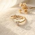 Sentimental Spark: The "Love" Script Ring