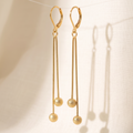 Sleek Motion: The Double-Sphere Chain Drop Earrings
