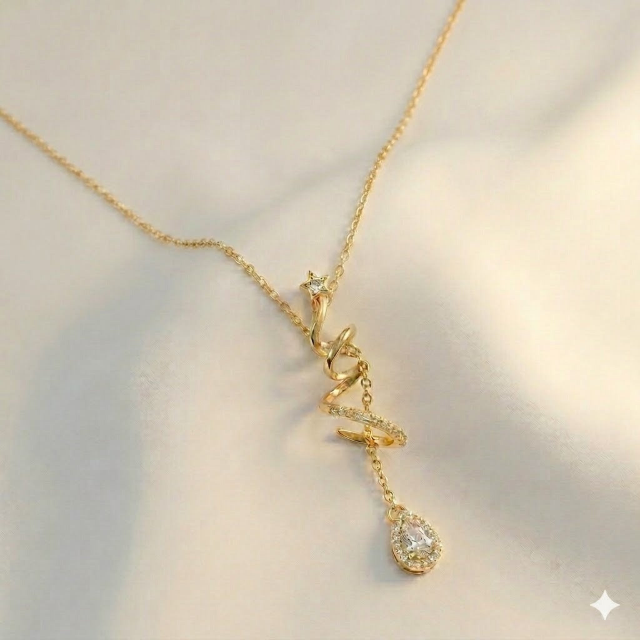 The Spiral Star & Teardrop Necklace
